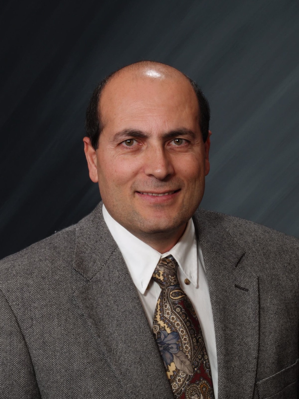 Dr. Tal Lavian, Ph.D. (Telecommunications, Computer Networks, Network Communications, Mobile Wireless, Internet Protocols)